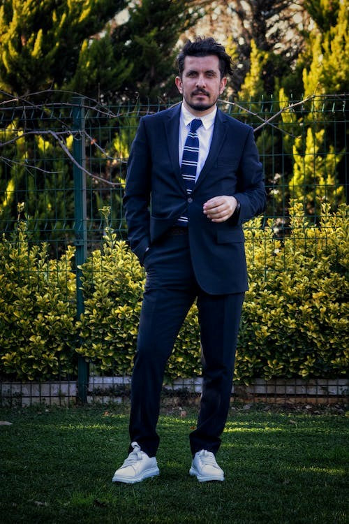 Mastering the Art of Wearing Suits with Trainers