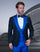 Mens Royal Blue Prom 2025 Tuxedo - Statement Men's Black Vested with Royal Blue Peak Lapel 100% Wool Tuxedo